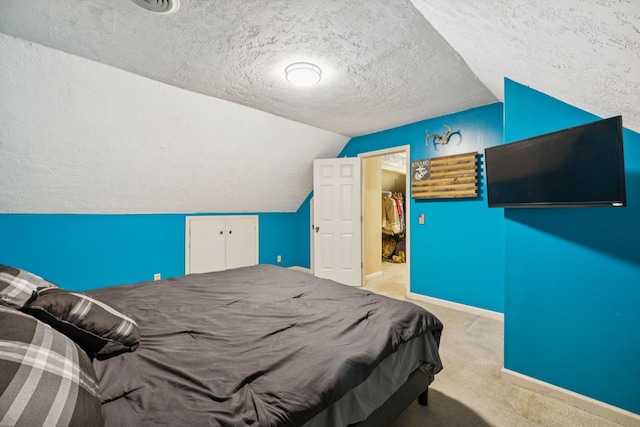 4651 Cynthia Ln, Murfreesboro, TN 37127 - carpeted bedroom with a textured ceiling and vaulted ceiling