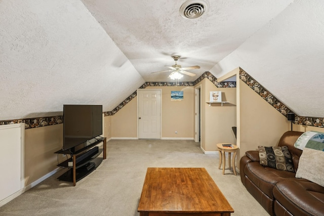 4651 Cynthia Ln, Murfreesboro, TN 37127 - living room featuring a textured ceiling, light carpet, ceiling fan, and lofted ceiling