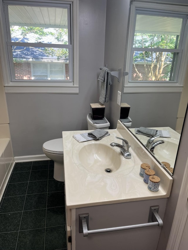 538 Lincoln St, Pulaski, TN 38478 - bathroom featuring plenty of natural light, tile patterned floors, vanity, and a bathtub
