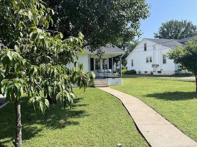 538 Lincoln St, Pulaski, TN 38478 - view of front of house featuring covered porch and a front yard