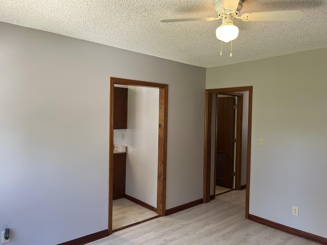 538 Lincoln St, Pulaski, TN 38478 - spare room with light wood-type flooring, ceiling fan, and a textured ceiling