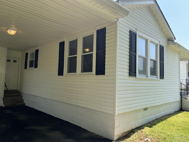 538 Lincoln St, Pulaski, TN 38478 - view of side of home featuring crawl space, an attached carport, and entry steps