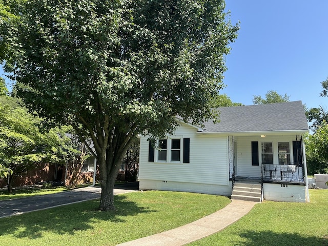 538 Lincoln St, Pulaski, TN 38478 - view of front of house with a porch, a front yard, a shingled roof, driveway, and crawl space