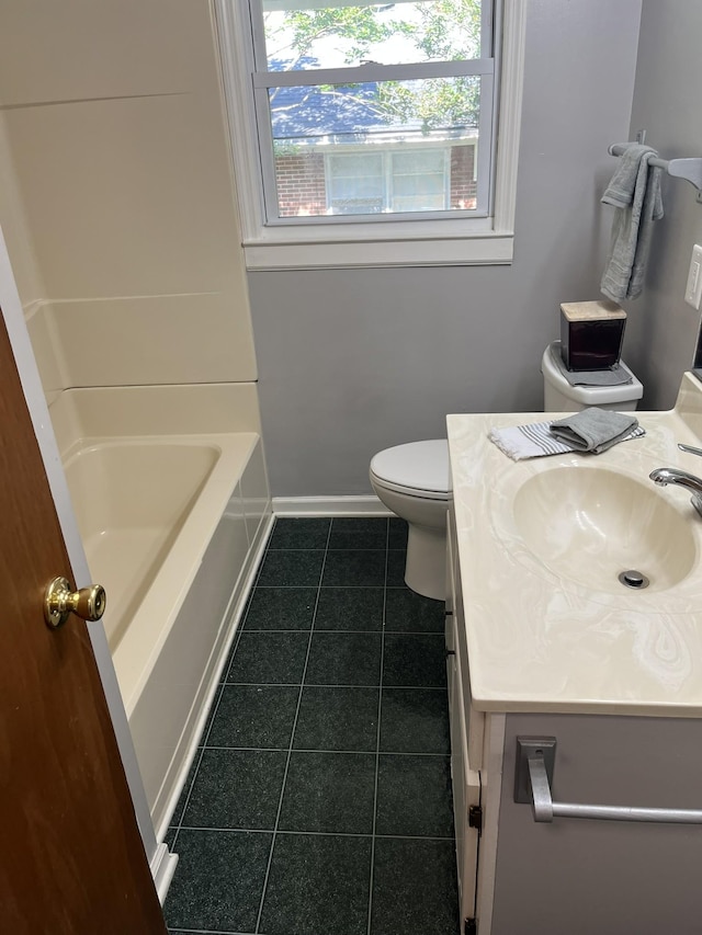 538 Lincoln St, Pulaski, TN 38478 - bathroom with tile patterned floors, vanity, and bathing tub / shower combination