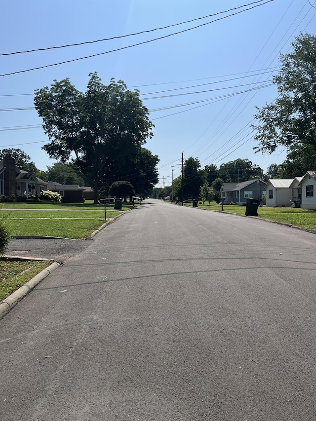 538 Lincoln St, Pulaski, TN 38478 - view of asphalt road featuring curbs and a residential view