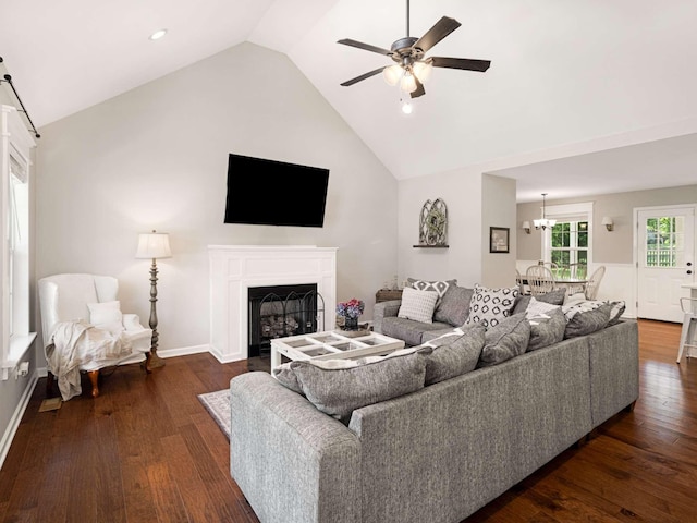 310 Diane Loop, White Bluff, TN 37187 - living area with dark wood-type flooring, a chandelier, a fireplace, a ceiling fan, and high vaulted ceiling