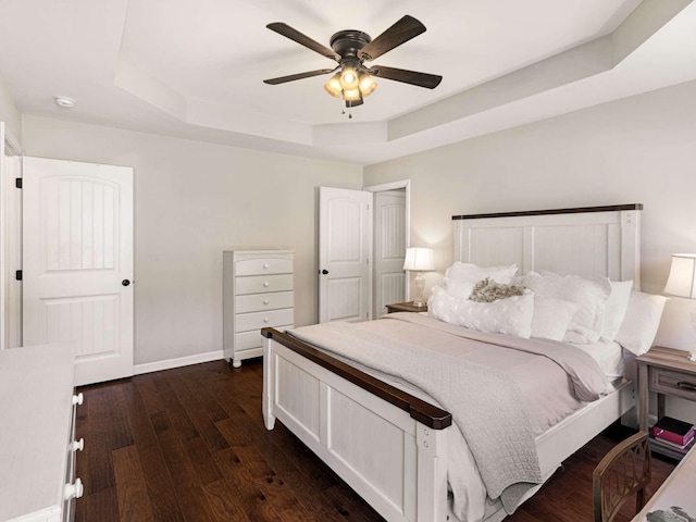 310 Diane Loop, White Bluff, TN 37187 - bedroom with a raised ceiling, dark wood-style floors, and a ceiling fan
