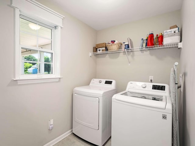 310 Diane Loop, White Bluff, TN 37187 - laundry area featuring independent washer and dryer and light tile patterned floors