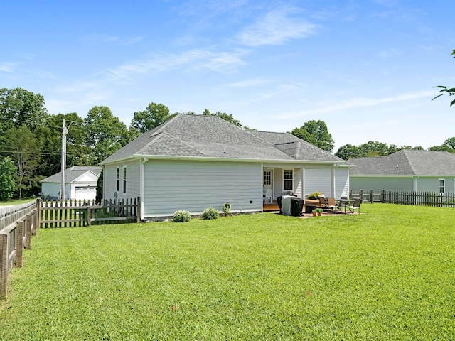 310 Diane Loop, White Bluff, TN 37187 - back of house featuring a patio area and roof with shingles