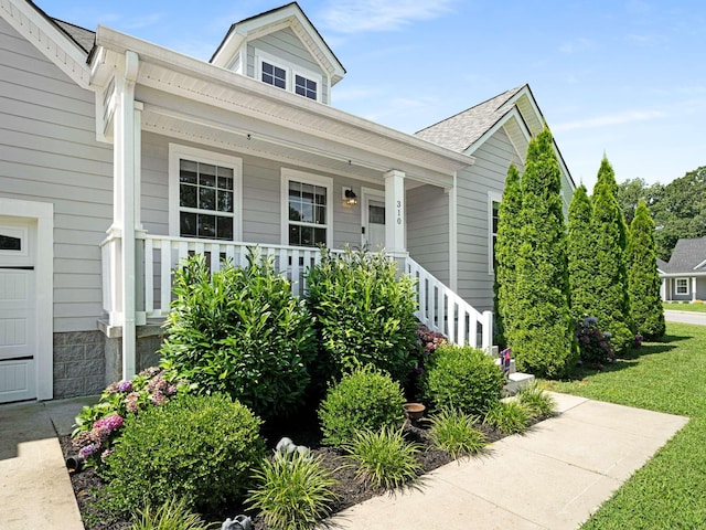 310 Diane Loop, White Bluff, TN 37187 - shotgun-style home featuring covered porch