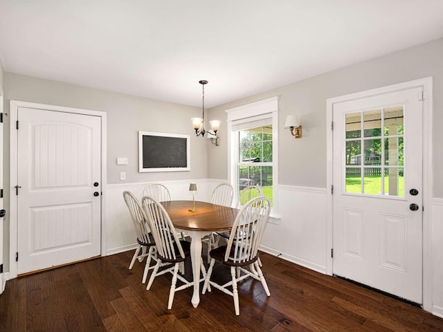 310 Diane Loop, White Bluff, TN 37187 - dining area featuring a wainscoted wall, dark wood-type flooring, and a chandelier