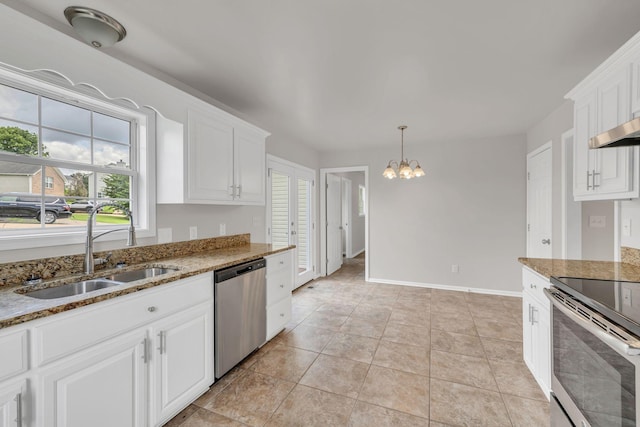 2995 Pipkin Hills Dr, Spring Hill, TN 37174 - kitchen featuring stainless steel appliances, a chandelier, white cabinets, and light stone countertops