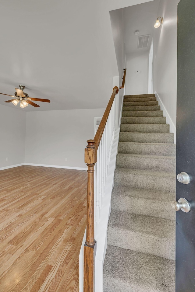 2995 Pipkin Hills Dr, Spring Hill, TN 37174 - staircase with ceiling fan and wood finished floors