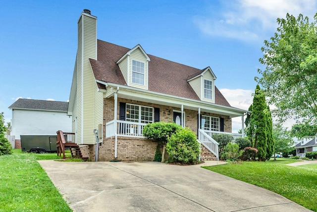 2995 Pipkin Hills Dr, Spring Hill, TN 37174 - cape cod home with covered porch, a front yard, and stairs