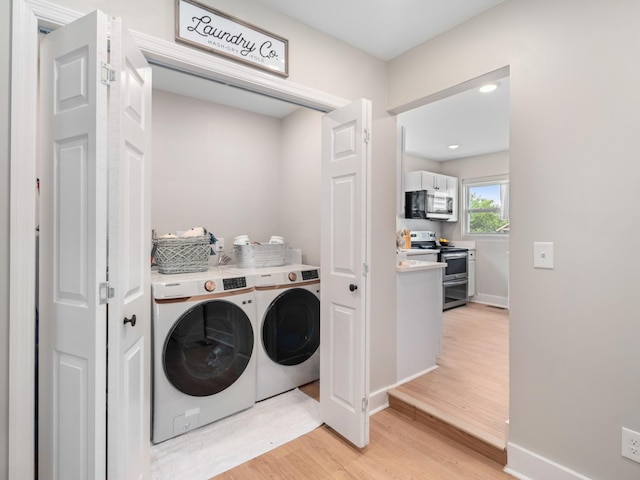 2011 Denham Ave, Columbia, TN 38401 - laundry area featuring washing machine and dryer and light wood finished floors