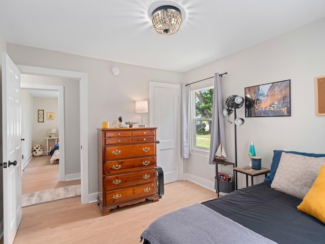 2011 Denham Ave, Columbia, TN 38401 - bedroom featuring light wood finished floors and a chandelier