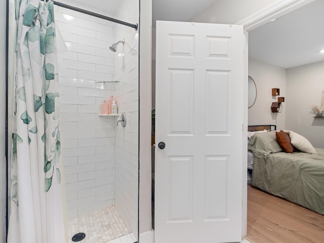 2011 Denham Ave, Columbia, TN 38401 - ensuite bathroom featuring a shower stall and wood finished floors
