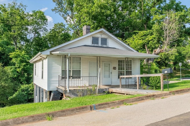 45 Lawn St, Clarksville, TN 37040 - view of front of house featuring a chimney and a porch
