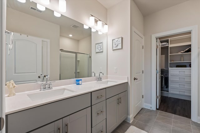 3702 Mathewson Way, Murfreesboro, TN 37128 - bathroom featuring a shower stall, tile patterned flooring, double vanity, and a spacious closet