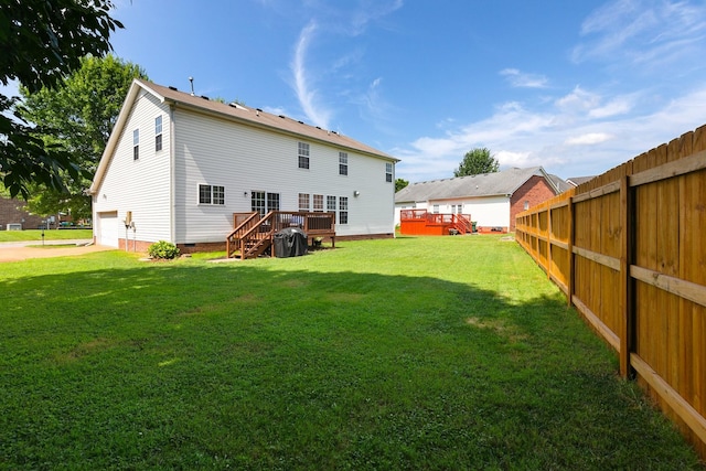 1902 Baileys Trace Dr, Spring Hill, TN 37174 - rear view of property featuring a wooden deck, an attached garage, crawl space, and stairway