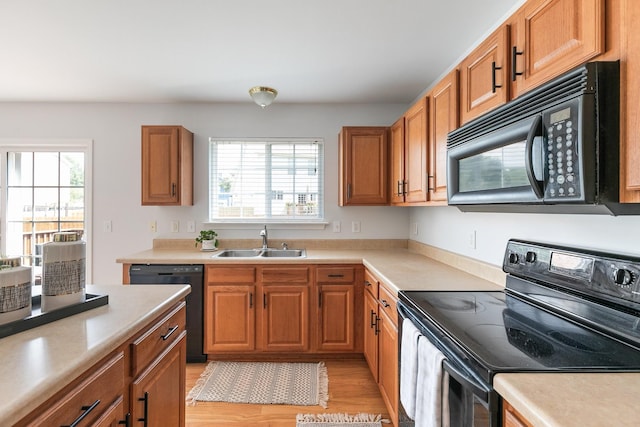1902 Baileys Trace Dr, Spring Hill, TN 37174 - kitchen featuring black appliances, plenty of natural light, and light countertops