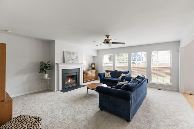 1902 Baileys Trace Dr, Spring Hill, TN 37174 - living area featuring light carpet, ceiling fan, and a fireplace with flush hearth