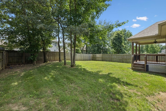 510 Sourwood Dr, Clarksville, TN 37042 - fenced backyard with a ceiling fan and a deck