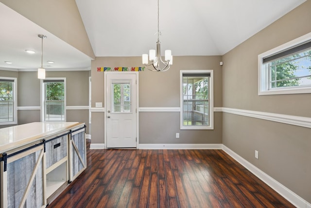 510 Sourwood Dr, Clarksville, TN 37042 - kitchen featuring vaulted ceiling, dark wood-style flooring, a chandelier, healthy amount of natural light, and decorative light fixtures