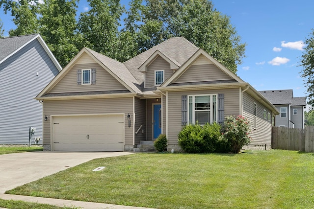510 Sourwood Dr, Clarksville, TN 37042 - view of front of property with driveway, a garage, and a shingled roof