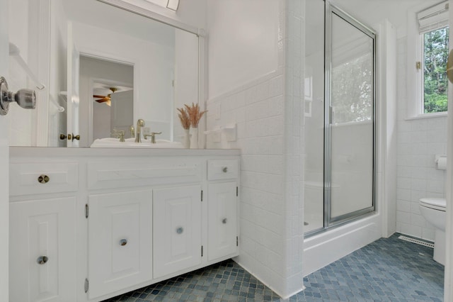 301 Brandywine Dr, Old Hickory, TN 37138 - bathroom with tile walls, a shower with door, tile patterned floors, vanity, and ceiling fan