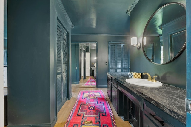 301 Brandywine Dr, Old Hickory, TN 37138 - bathroom with ornamental molding, wood finished floors, vanity, and a closet