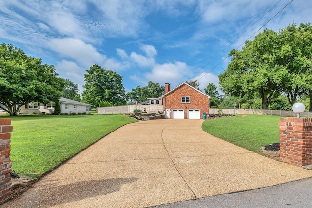 301 Brandywine Dr, Old Hickory, TN 37138 - view of home's exterior featuring a chimney, brick siding, and a garage