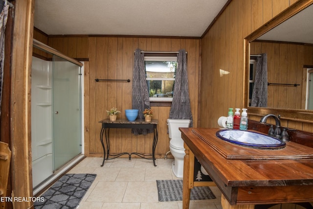 197 Wedgewood Ln, Spring City, TN 37381 - full bath featuring crown molding, wood walls, a stall shower, vanity, and a textured ceiling