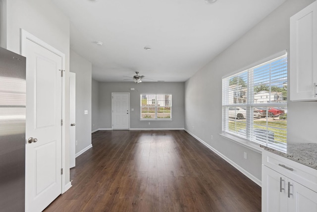 241 Tara Ct, Columbia, TN 38401 - unfurnished living room with dark wood finished floors and ceiling fan