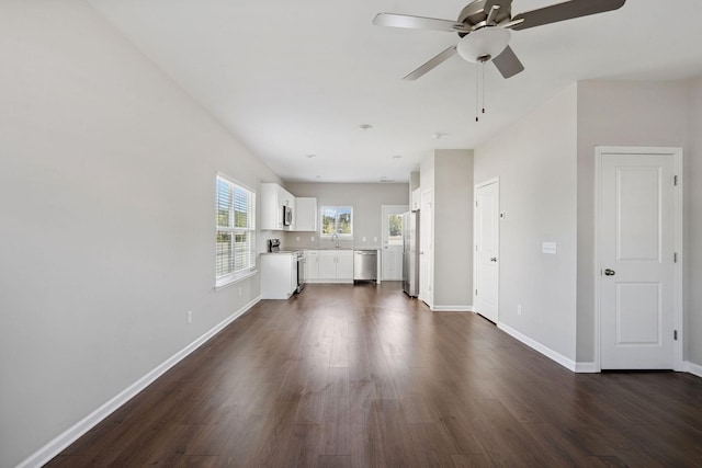 241 Tara Ct, Columbia, TN 38401 - unfurnished living room with dark wood finished floors and a ceiling fan