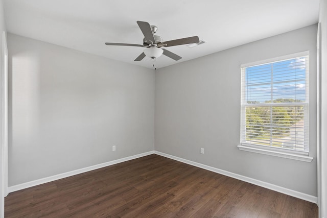 241 Tara Ct, Columbia, TN 38401 - unfurnished room with dark wood finished floors, healthy amount of natural light, and a ceiling fan