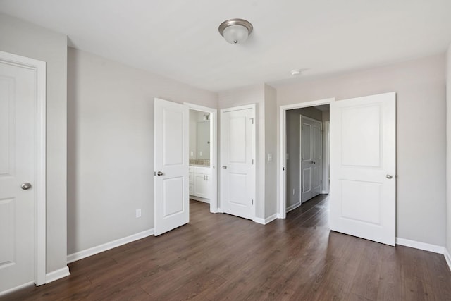 241 Tara Ct, Columbia, TN 38401 - unfurnished bedroom featuring dark wood-type flooring
