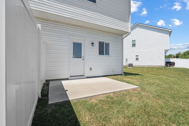 241 Tara Ct, Columbia, TN 38401 - back of property featuring a patio and a lawn
