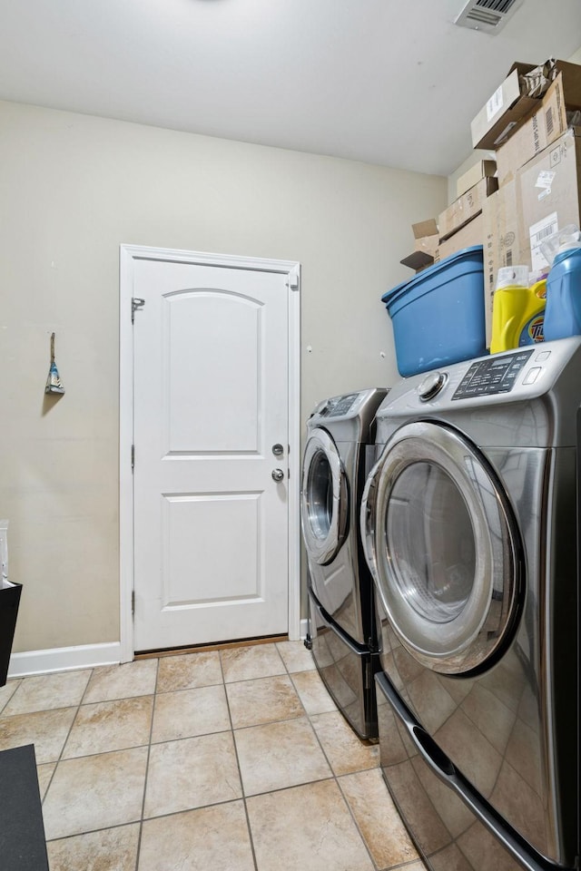 1609 Merritt St Unit A, Old Hickory, TN 37138 - laundry room featuring washer and dryer and light tile patterned floors