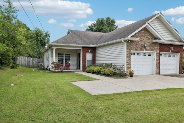 1609 Merritt St Unit A, Old Hickory, TN 37138 - single story home with concrete driveway, a garage, brick siding, and a shingled roof