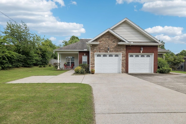 1609 Merritt St Unit A, Old Hickory, TN 37138 - single story home featuring a front yard, driveway, an attached garage, and stone siding