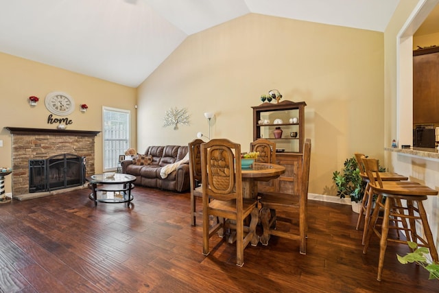 1609 Merritt St Unit A, Old Hickory, TN 37138 - dining area featuring vaulted ceiling, wood finished floors, and a stone fireplace