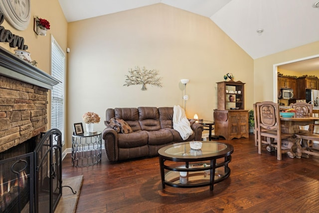 1609 Merritt St Unit A, Old Hickory, TN 37138 - living area featuring high vaulted ceiling, a lit fireplace, and hardwood / wood-style flooring