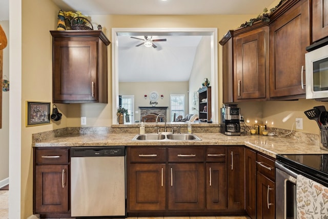 1609 Merritt St Unit A, Old Hickory, TN 37138 - kitchen featuring appliances with stainless steel finishes, a ceiling fan, light countertops, and dark brown cabinets