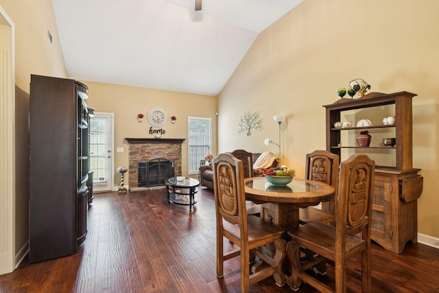 1609 Merritt St Unit A, Old Hickory, TN 37138 - dining room featuring healthy amount of natural light, dark wood-style floors, a stone fireplace, and high vaulted ceiling