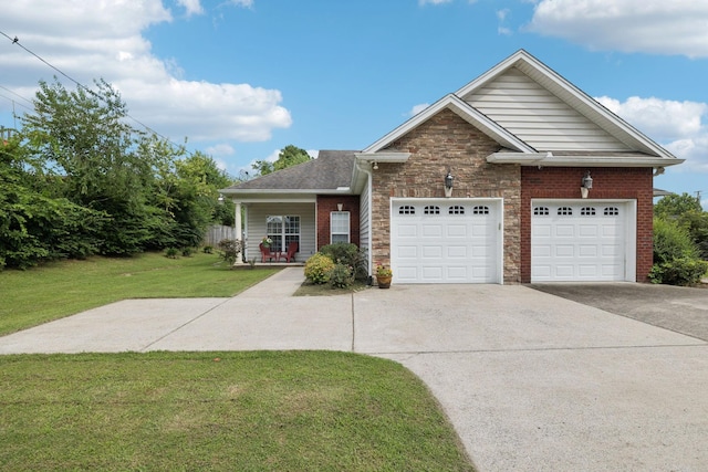 1609 Merritt St Unit A, Old Hickory, TN 37138 - ranch-style home with a front yard, driveway, a garage, and brick siding