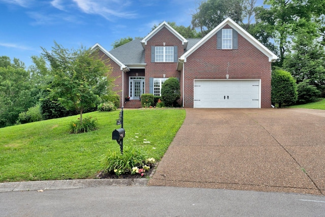 2785 Rutland Ct, Thompsons Station, TN 37179 - traditional-style home featuring brick siding, concrete driveway, a front lawn, and an attached garage
