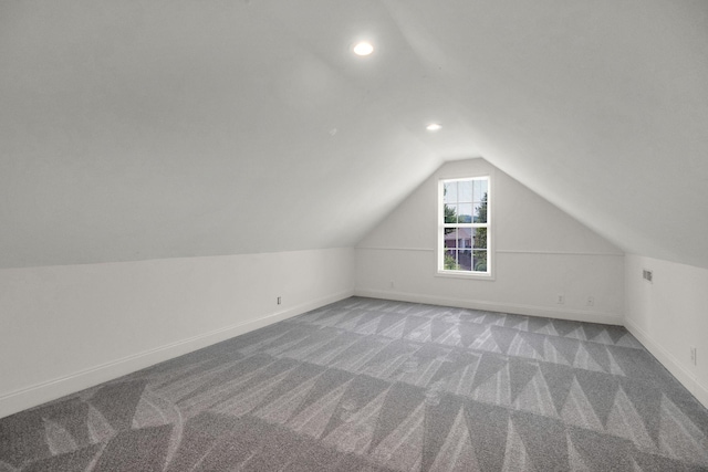 2785 Rutland Ct, Thompsons Station, TN 37179 - additional living space with vaulted ceiling, carpet flooring, and recessed lighting