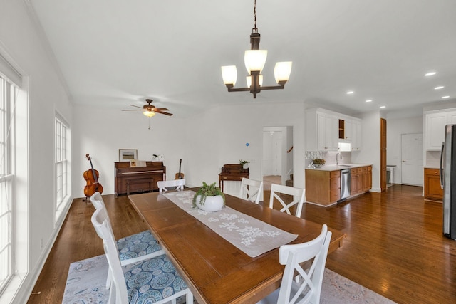 2785 Rutland Ct, Thompsons Station, TN 37179 - dining space with dark wood-style flooring, recessed lighting, ceiling fan, and a chandelier