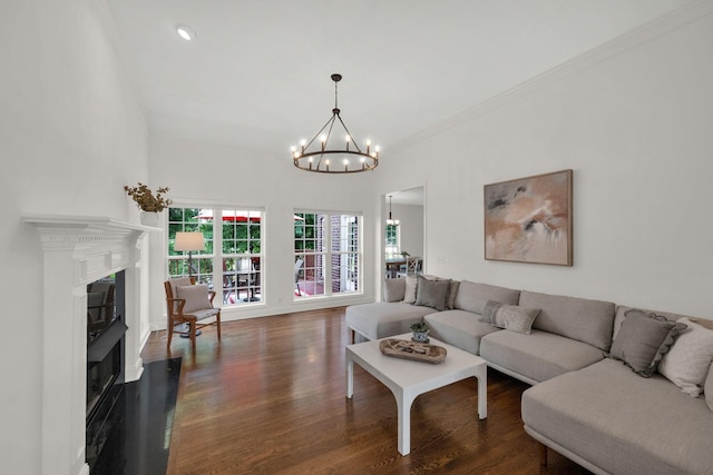 2785 Rutland Ct, Thompsons Station, TN 37179 - living area featuring a chandelier, dark wood-type flooring, a fireplace, crown molding, and recessed lighting